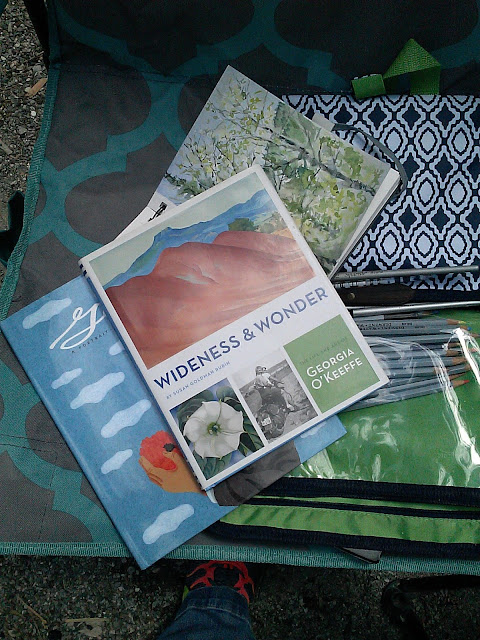travel watercolor art kit and books for reading Christy Sheeler Artist