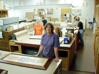 Peggy (in blue) rules the roost in Gallery One's framing department