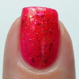 red jelly nail polish with shifting flakies