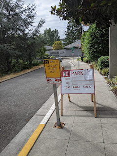 Great new sidewalk. Silly placement of No Parking sign