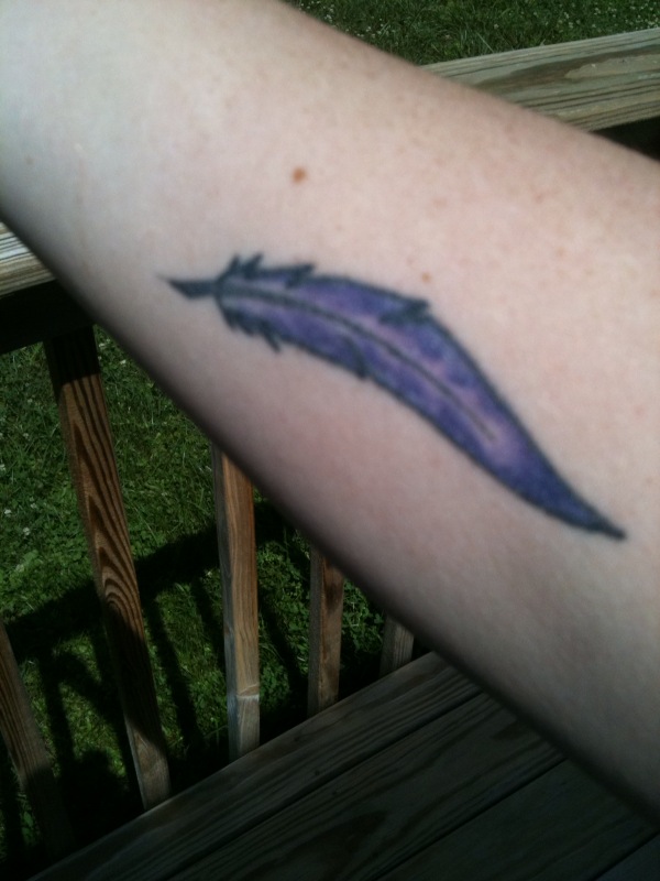 The tattoo is a quill