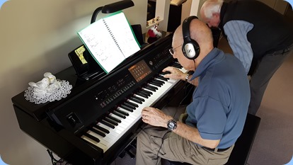 Dennis Lyons giving the Yamaha Clavinova CVP-709 a whirl.