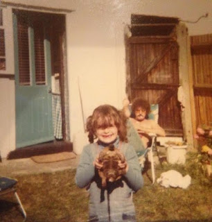 Jess Kidd with a tortoise in childhood