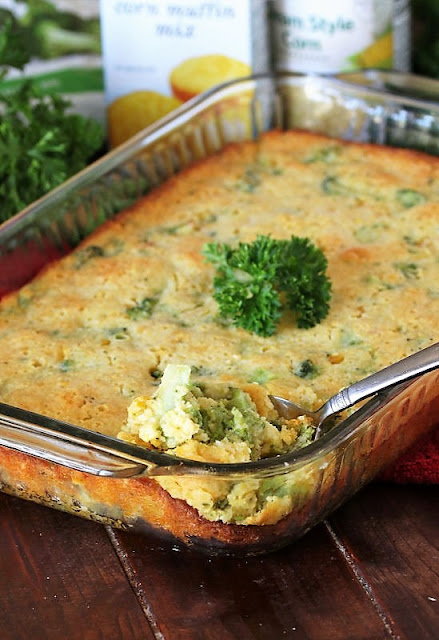 Pan of Broccoli Cornbread Casserole with Serving Spoon in Corner Image