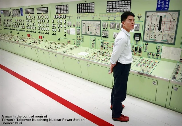 A man in the control room of Taiwan's Taipower Kuosheng nuclear power station