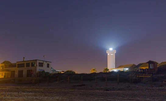 Copyright Vernon Chalmers Lighthouse over Milnerton Beach / Woodbridge Island