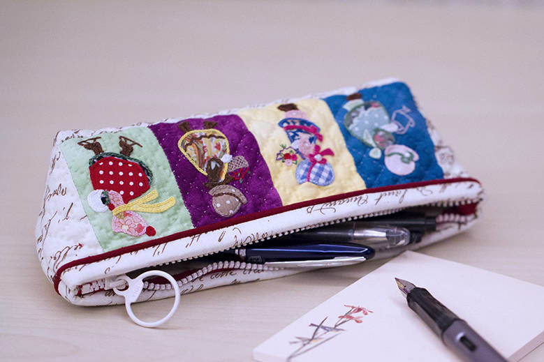 Cosmetic bag or pencil case. Application of fabric and embroidery. DIY step-by-step tutorial.