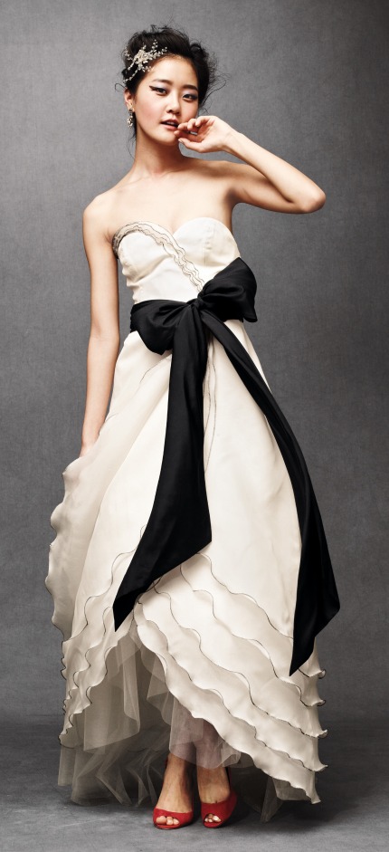 Tiered Tulip Gown Stunning long white wedding dress with a huge black bow