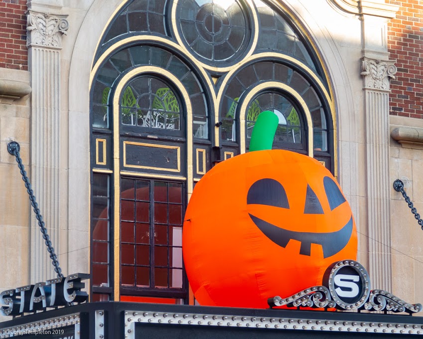 Portland, Maine USA October 2019 photo by Corey Templeton. A large pumpkin atop the State Theater marquee, perhaps related to the recent "Great Pumpkin Ball" by EqualityMaine.