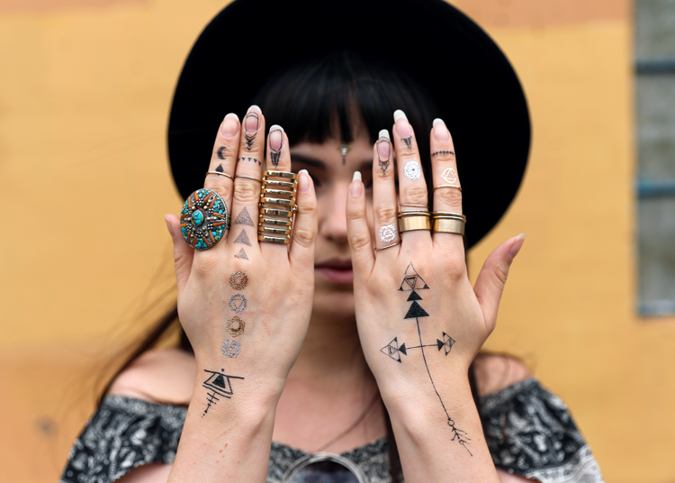 hippy, hippie, tattoos, tattooed hands, bohemian rings, wide brim fedora