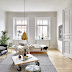 A beautiful white apartment with notes of grey, green and brass