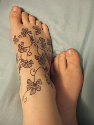 Flower ankle tattoos design for women