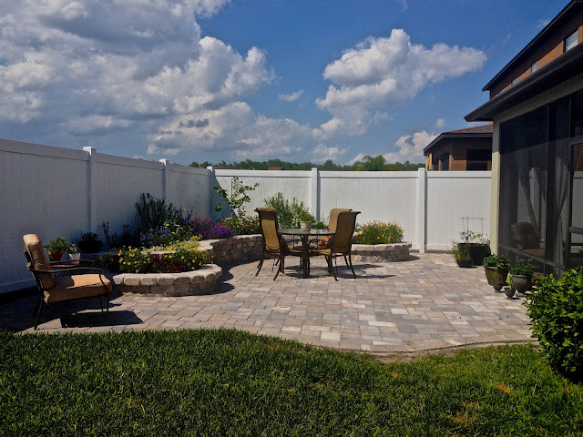 outdoor patio with raised garden bed