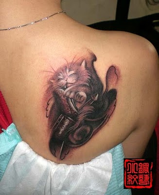 For example Design Your Own Tattoo. Top back tattoo on woman