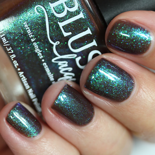 Murky brown purple nail polish that shifts to blue and green