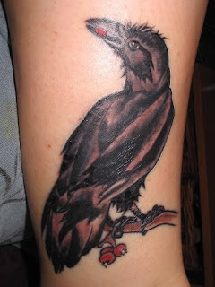 crow tattoo on hand