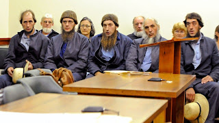 Twelve charged with hate crimes in Amish beard cutting