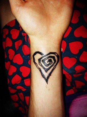 heart tattoos on hip. heart tattoos for women with