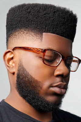 low fade haircut black male with beared