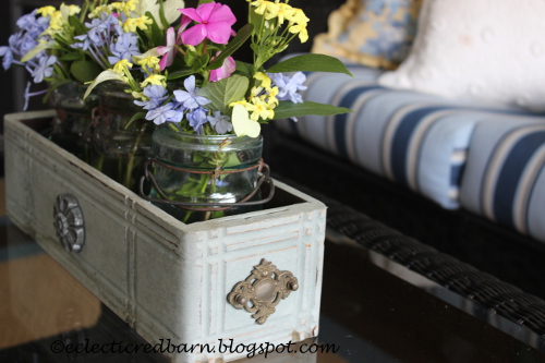 Painted sewing drawer wiht mason jars and flowers