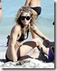 MAVRIXONLINE.COM AnnaLynne McCord and boyfriend Kellan Lutz enjoy more time on the beach during their New Year's vacation in South Beach. The two build sand castles and play football in the sand and relax on lounge chairs. Miami, FL. 1/3/09. Fees must be agreed for image use. Byline, credit, TV usage, web usage or linkback must read MAVRIXONLINE.COM. Failure to byline correctly will incur double the agreed fee. Tel: 305 542 9275 or 954 698 6777.