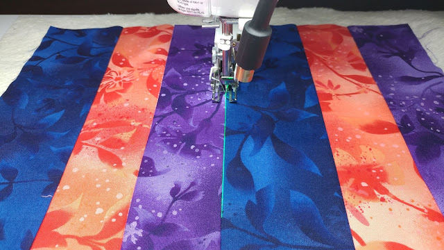 Using a sewing machine laser to stitch in the ditch