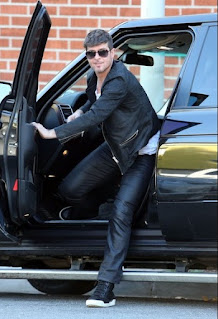 Julian Fuego Thicke's dad Robin coming out of the car