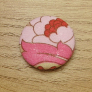 Finished fabric covered button