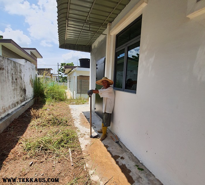 Clearing Weeds Using Hoe Garden Tool