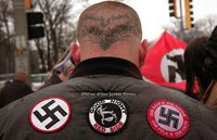 Skinhead wears nazi symbols