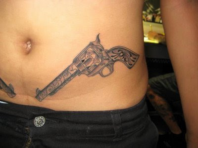 slender hip – how cute? Gun Tattoos For Girls