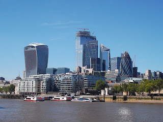 View of London City skyscrapers from Tower Bridge