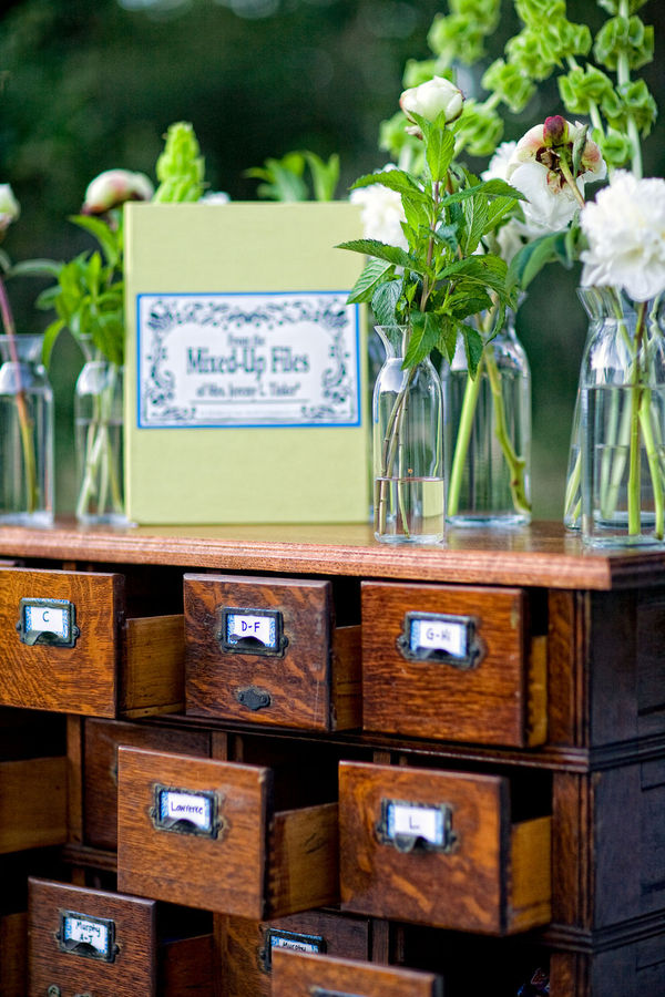 i love the science theme with these beakers and old filing cabinet what a