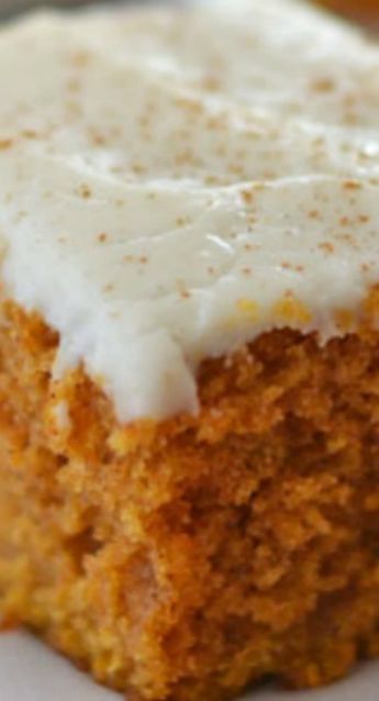 This Pumpkin Snack Cake is packed full of fall flavors, and topped with a easy cream cheese cinnamon-dusted frosting!