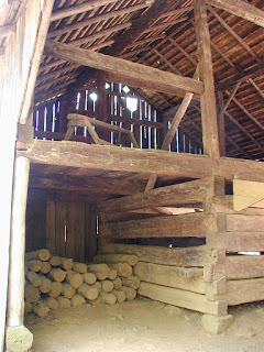 Somewhat typical interior structure of a barn.