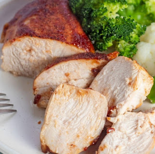 calories in chicken breast per oz