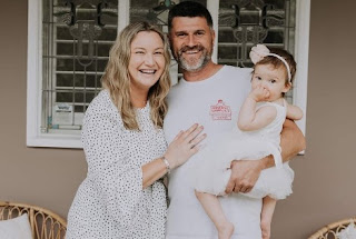 Hannah Ferrier with her husband Josh Roberts & their daughter