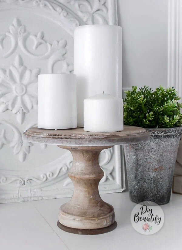 wood pedestal with candles