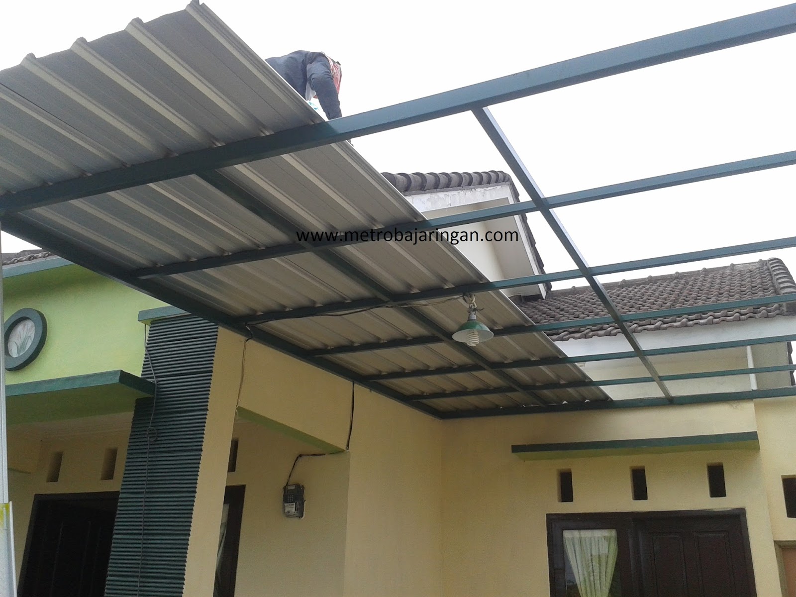 BERALIH DARI ATAP POLYCARBONATE KE ATAP SPANDEK METRO TRUSS