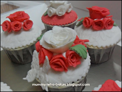  Red and White gumpaste rose as the wedding theme is Red White