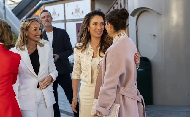 Crown Princess Victoria wore a rose Odnala wool coat by Andiata. By Malina Adele dress. Queen Silvia wore a red blazer