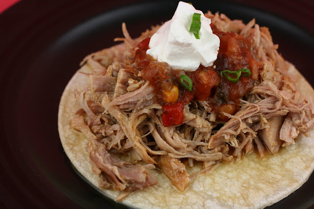 The best Carnitas recipe, ever. Made in the slow cooker, it uses fresh orange and lime juice and lots of cumin and garlic. YUM.