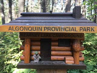 Log cabin information box at Kearney Lake Campground, Algonquin Provincial Park, Ontario, Canada