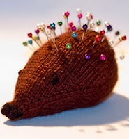 http://www.ravelry.com/patterns/library/waste-yarn-hedgehog