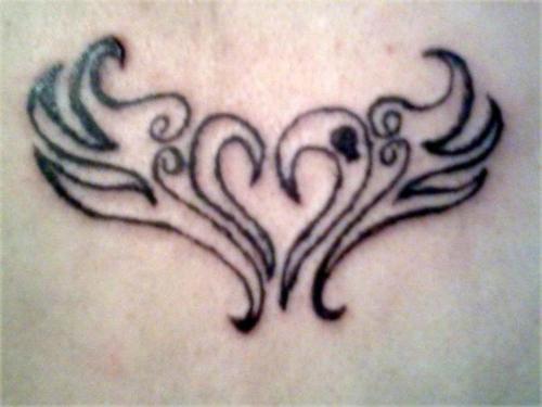 Labels heart wings tattoo