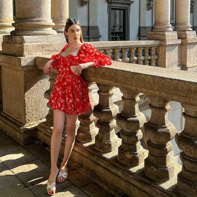 Branca Bacci-Brunelli – Most Beautiful Transgender Model in Red Print floral Mini Dress Photoshoot