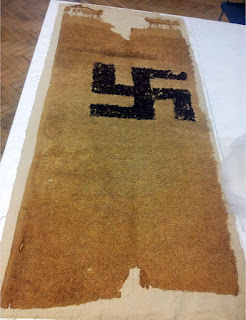 Egyptian textile with a large swastika.