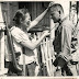 Captain Nieves Fernandez shows to an American soldier how she used her long knife to silently kill Japanese soldiers during occupation