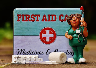 cna first aid kit and doll