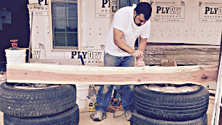 Jaime starts shaping the log for the mantle.